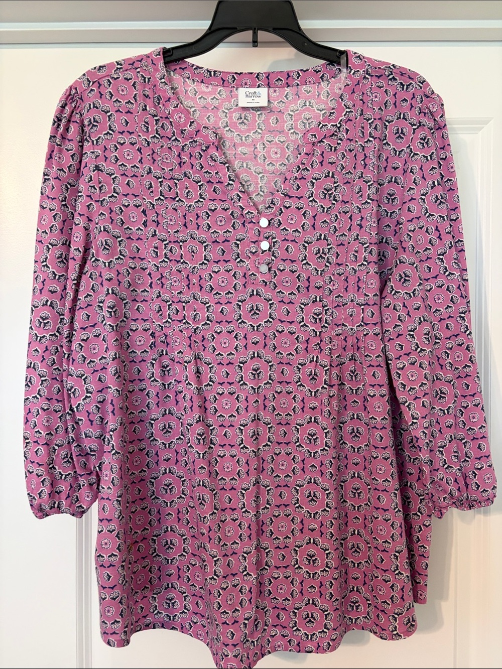C. Wonder Pink Medallion Henley Tunic